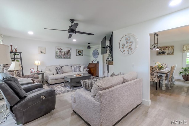 1304 Highland Dr, Rolla, MO 65401 - living area with ceiling fan, light wood finished floors, and recessed lighting