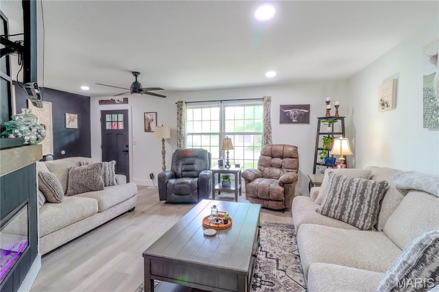 1304 Highland Dr, Rolla, MO 65401 - living area featuring wood finished floors, recessed lighting, and a ceiling fan