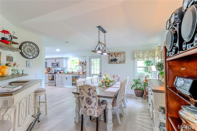 1304 Highland Dr, Rolla, MO 65401 - dining area featuring light wood finished floors