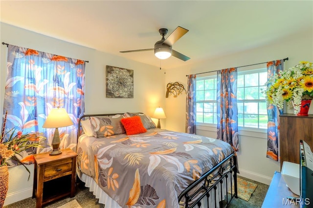 1304 Highland Dr, Rolla, MO 65401 - bedroom with baseboards and a ceiling fan
