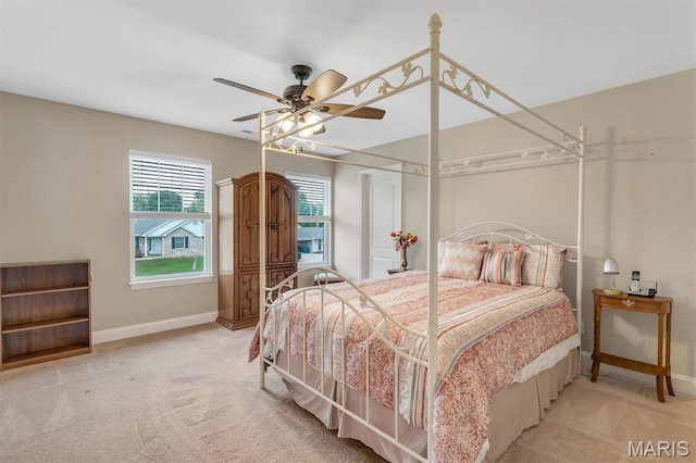 306 Essen Ln, Ballwin, MO 63021 - bedroom with light colored carpet and a ceiling fan