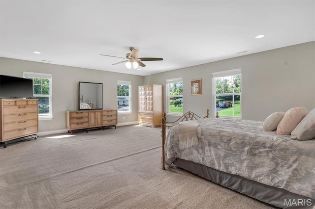 306 Essen Ln, Ballwin, MO 63021 - carpeted bedroom with multiple windows, recessed lighting, and a ceiling fan
