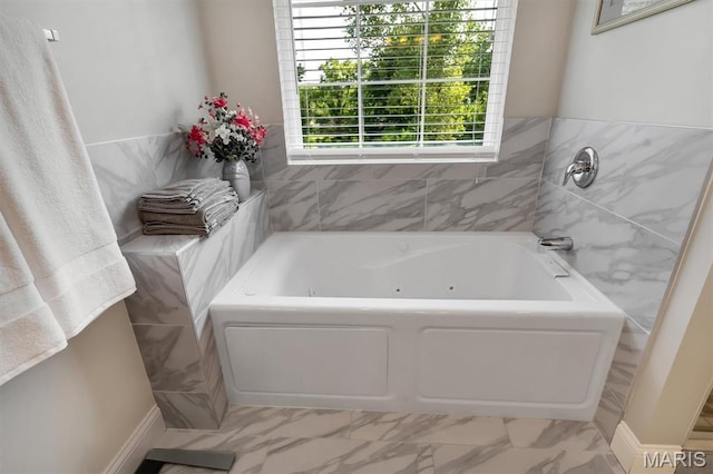 306 Essen Ln, Ballwin, MO 63021 - full bath featuring a whirlpool tub and marble finish floors