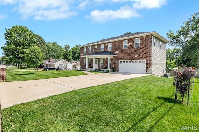 306 Essen Ln, Ballwin, MO 63021 - view of front facade featuring a garage, concrete driveway, a front lawn, and brick siding