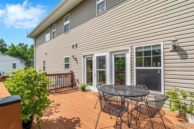 306 Essen Ln, Ballwin, MO 63021 - wooden terrace featuring outdoor dining space