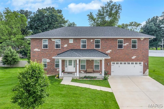 306 Essen Ln, Ballwin, MO 63021 - view of front of home with a garage, driveway, a shingled roof, and brick siding