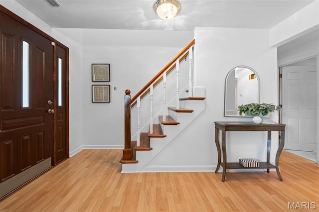 12330 Cape Cod Dr, Creve Coeur Township, MO 63146 - entrance foyer with light wood-style flooring and stairs