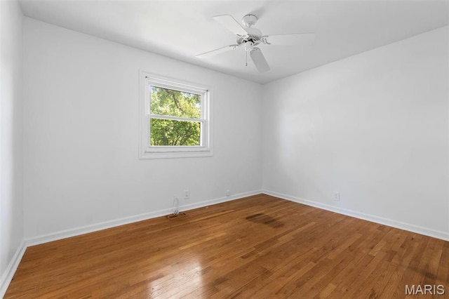 12330 Cape Cod Dr, Creve Coeur Township, MO 63146 - spare room featuring hardwood / wood-style flooring and baseboards