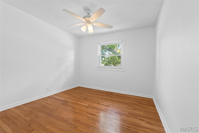 12330 Cape Cod Dr, Creve Coeur Township, MO 63146 - spare room featuring wood finished floors and ceiling fan