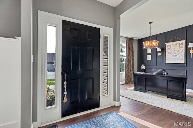 144 Wilmer Valley Dr, Wentzville, MO 63385 - foyer featuring a chandelier and wood finished floors