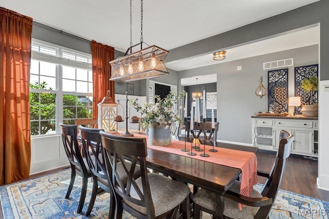 144 Wilmer Valley Dr, Wentzville, MO 63385 - dining space with wood finished floors and a chandelier