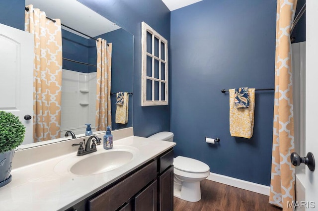 144 Wilmer Valley Dr, Wentzville, MO 63385 - bathroom with vanity, wood finished floors, and a shower with curtain