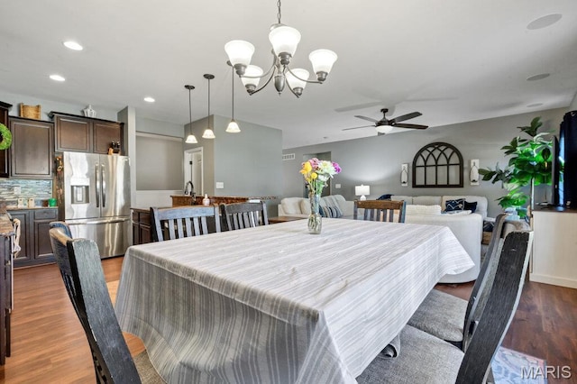 144 Wilmer Valley Dr, Wentzville, MO 63385 - dining room with ceiling fan, a chandelier, wood finished floors, and recessed lighting