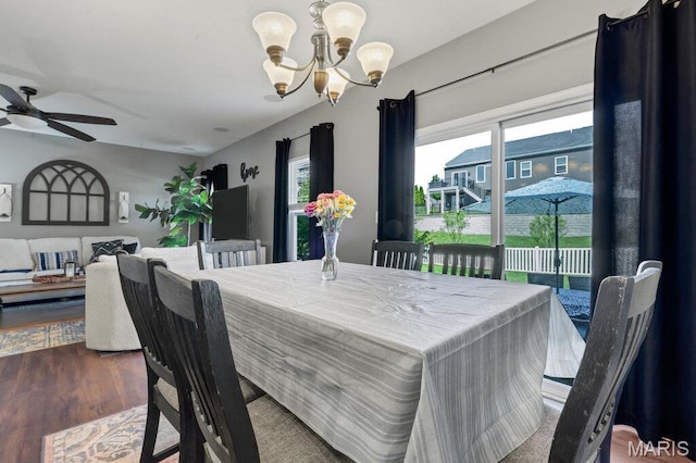 144 Wilmer Valley Dr, Wentzville, MO 63385 - dining area with a chandelier, ceiling fan, and wood finished floors