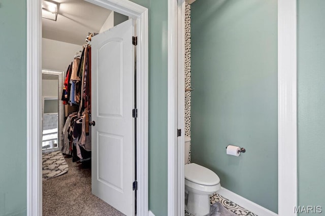 144 Wilmer Valley Dr, Wentzville, MO 63385 - bathroom featuring toilet and baseboards