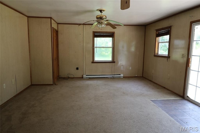 1820 Doris Ave, Cahokia, IL 62206 - spare room featuring baseboard heating, a ceiling fan, and light carpet