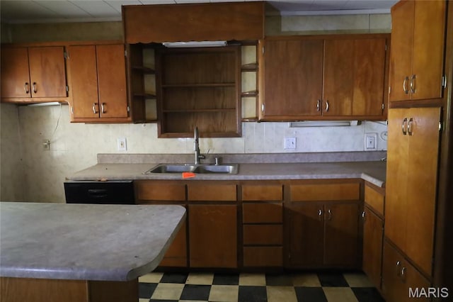 1820 Doris Ave, Cahokia, IL 62206 - kitchen with open shelves, light flooring, brown cabinets, and backsplash
