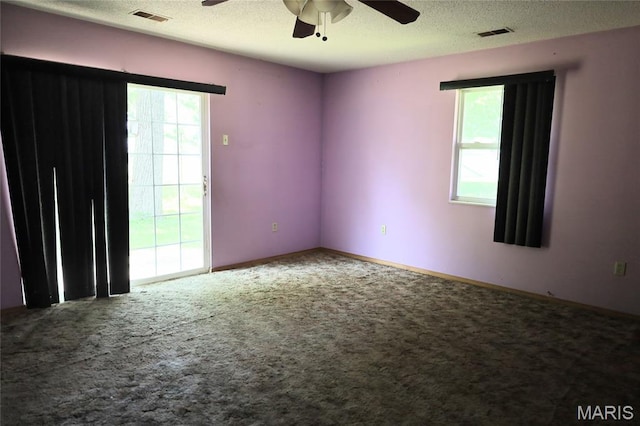 1820 Doris Ave, Cahokia, IL 62206 - carpeted spare room featuring a ceiling fan and a textured ceiling