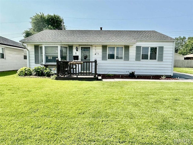 116 Charlene St, East Alton, IL 62024 - ranch-style house with a front lawn and a shingled roof
