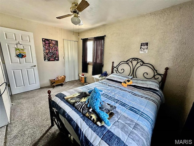 116 Charlene St, East Alton, IL 62024 - carpeted bedroom featuring a textured wall and a ceiling fan