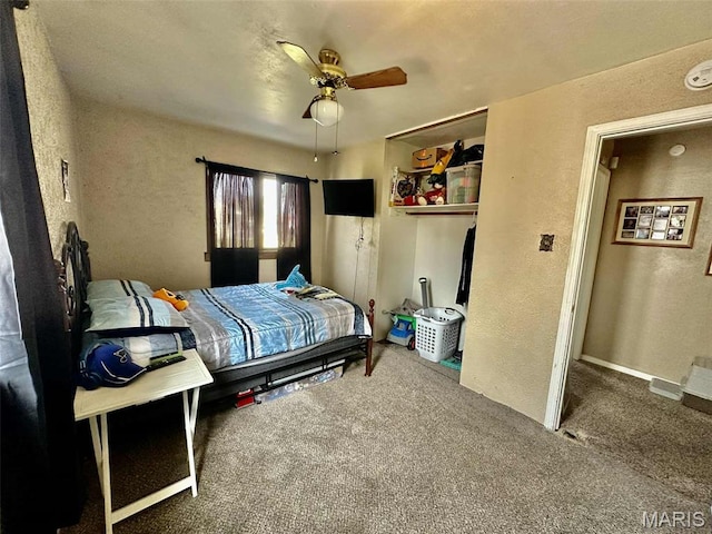 116 Charlene St, East Alton, IL 62024 - bedroom with a textured wall, carpet floors, ceiling fan, and a closet