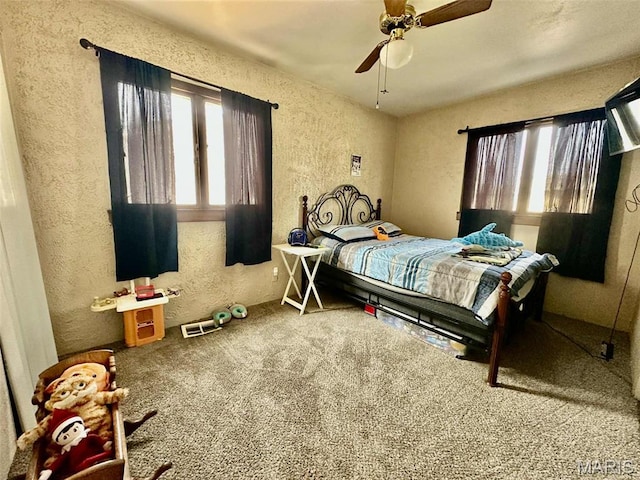 116 Charlene St, East Alton, IL 62024 - bedroom with a textured wall, carpet floors, and ceiling fan