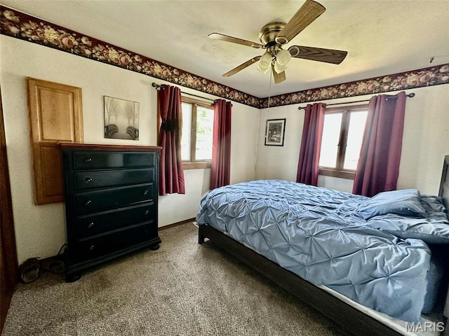 116 Charlene St, East Alton, IL 62024 - carpeted bedroom with a ceiling fan