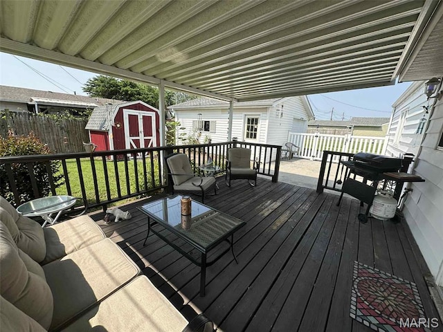 116 Charlene St, East Alton, IL 62024 - wooden deck with outdoor lounge area and area for grilling