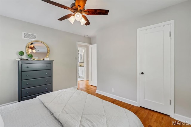657 Lilac Ave, Webster Groves, MO 63119 - bedroom featuring wood finished floors and a ceiling fan