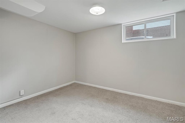 657 Lilac Ave, Webster Groves, MO 63119 - below grade area with carpet floors and baseboards