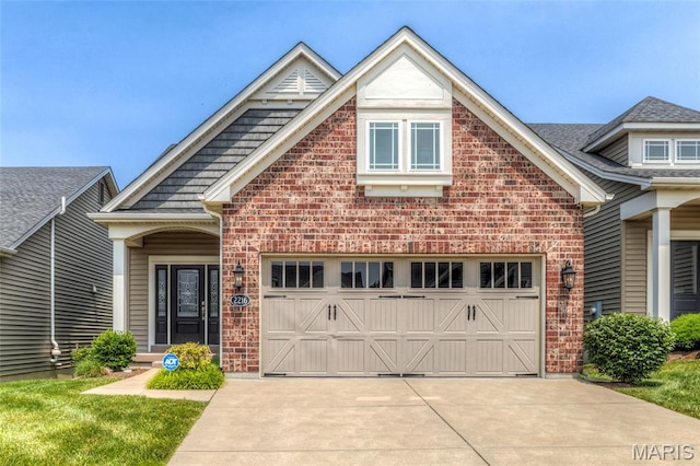 2216 Cournier St, Saint Charles, MO 63301 - craftsman-style home featuring brick siding and concrete driveway