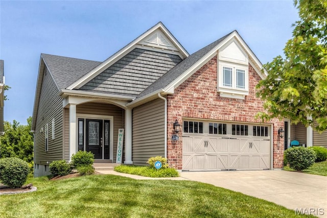 2216 Cournier St, Saint Charles, MO 63301 - craftsman inspired home with brick siding, driveway, a front yard, and a shingled roof