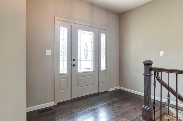 2216 Cournier St, Saint Charles, MO 63301 - entrance foyer with dark wood finished floors and baseboards