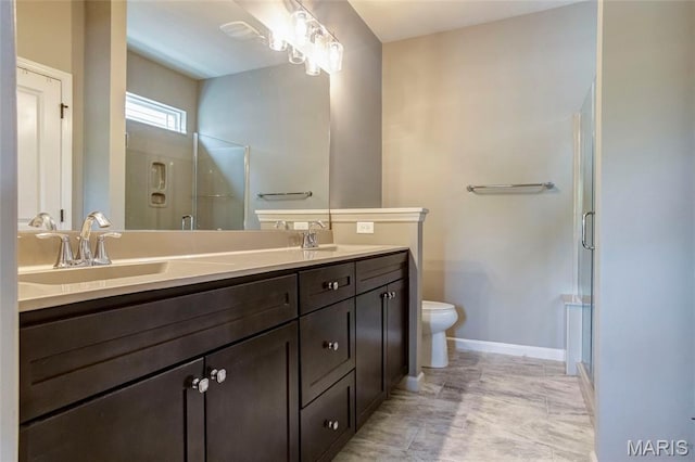 2216 Cournier St, Saint Charles, MO 63301 - bathroom featuring a stall shower and double vanity