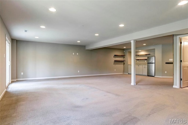 2216 Cournier St, Saint Charles, MO 63301 - unfurnished living room featuring light colored carpet and recessed lighting