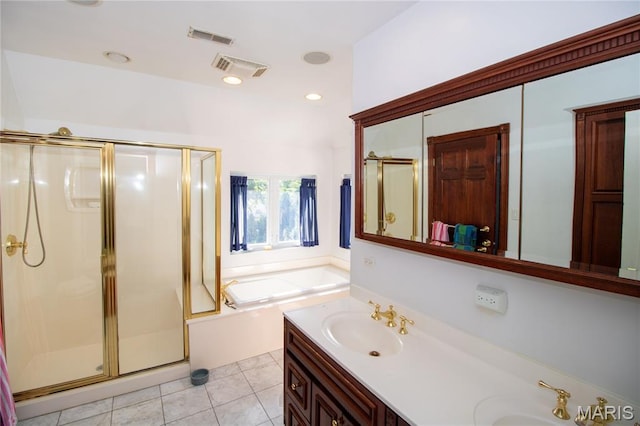 37 Joy Ave, Webster Groves, MO 63119 - full bath featuring a stall shower, a garden tub, double vanity, and tile patterned floors