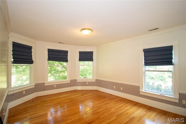 37 Joy Ave, Webster Groves, MO 63119 - empty room with wood finished floors and crown molding