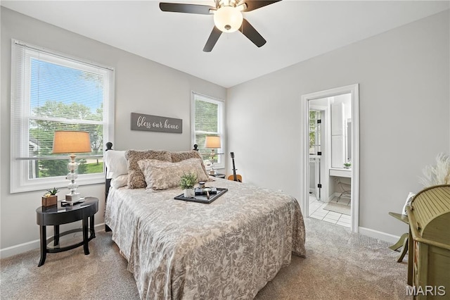 17 Eagles Way Ln, Lake St Louis, MO 63367 - carpeted bedroom with connected bathroom and a ceiling fan