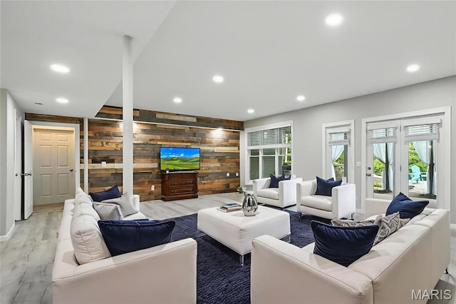 17 Eagles Way Ln, Lake St Louis, MO 63367 - living area with recessed lighting, light wood-style flooring, and wood walls