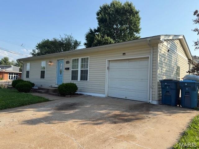 1496 Ville Rosa Ln, Hazelwood, MO 63042 - ranch-style house featuring concrete driveway and an attached garage