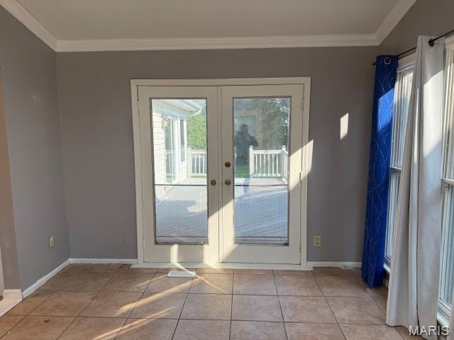 1496 Ville Rosa Ln, Hazelwood, MO 63042 - doorway to outside with french doors, ornamental molding, and light tile patterned floors