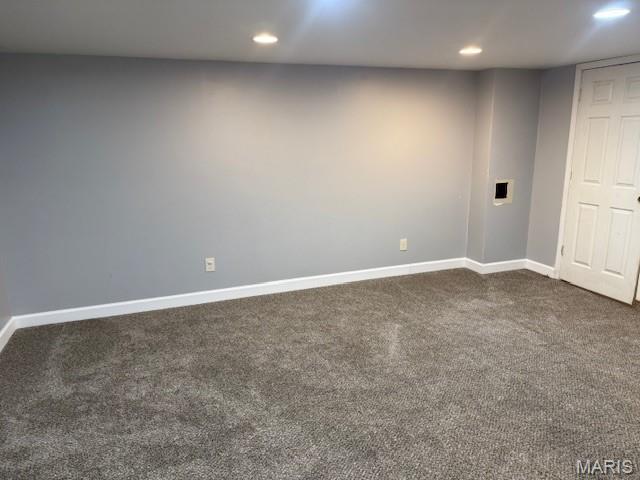 1496 Ville Rosa Ln, Hazelwood, MO 63042 - spare room with dark colored carpet and recessed lighting