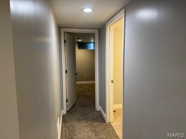1496 Ville Rosa Ln, Hazelwood, MO 63042 - hallway with light carpet and baseboards