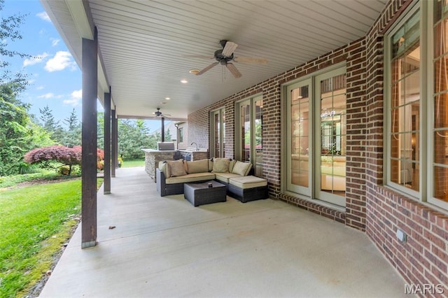 3046 Beaver Creek Cpe, Girardeau, MO 63701 - view of patio / terrace with ceiling fan, outdoor lounge area, and an outdoor kitchen