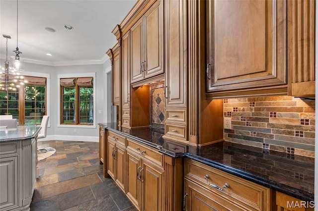 3046 Beaver Creek Cpe, Girardeau, MO 63701 - kitchen with brown cabinets, stone tile floors, dark stone countertops, crown molding, and tasteful backsplash