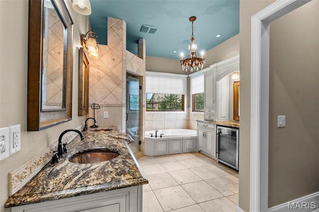 3046 Beaver Creek Cpe, Girardeau, MO 63701 - full bath featuring wine cooler, vanity, a bath, and tile patterned flooring