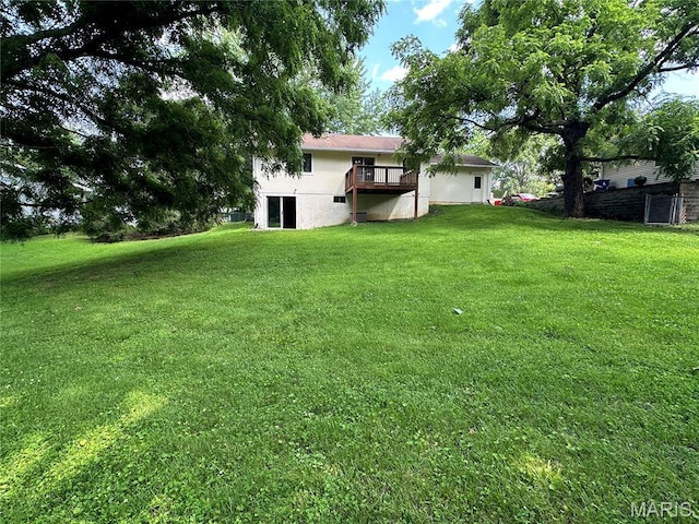 807 Corey Ct, Wentzville, MO 63385 - view of grassy yard with a wooden deck