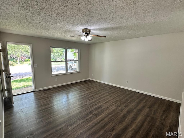 807 Corey Ct, Wentzville, MO 63385 - unfurnished room with a ceiling fan, dark wood-style flooring, baseboards, and a textured ceiling