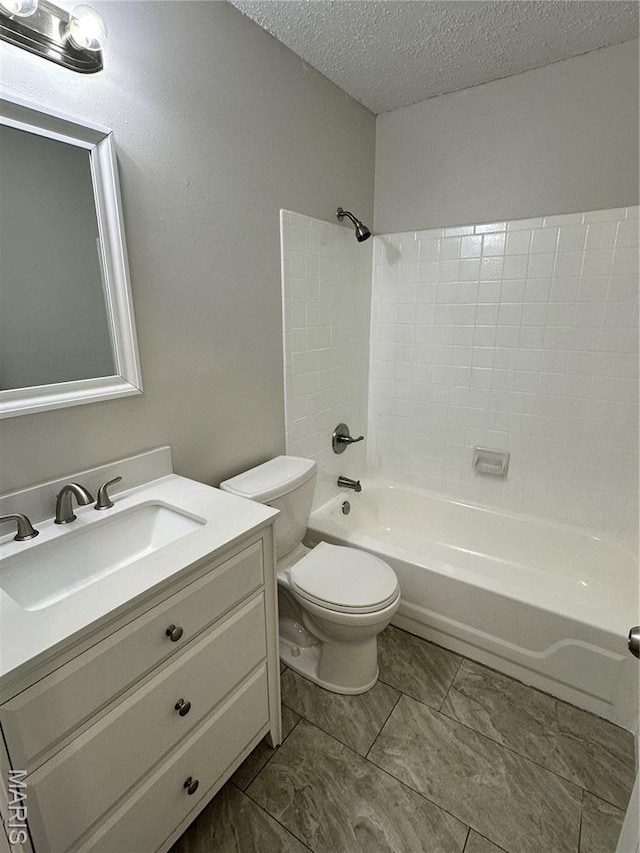 807 Corey Ct, Wentzville, MO 63385 - full bath featuring toilet, vanity, a textured ceiling, and shower / washtub combination