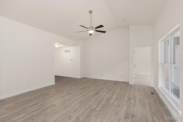 1720 Martingale Ln, Eureka, MO 63025 - spare room featuring light wood-style flooring, ceiling fan, vaulted ceiling, and baseboards